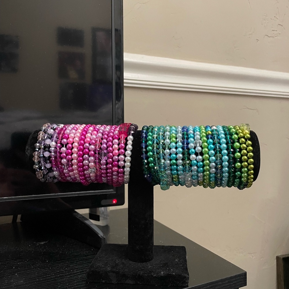 Homemade bracelets I made 35 of them. The display holder is not for sale .